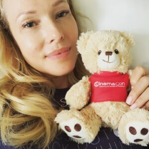 Erin Cummings Instagram - Baby Degnan’s first teddy bear will also be their first swag. Thanks @cinemacon. This is going right in the nursery for the next generation of movie lovers. 

So far, CinemaCon in Vegas has been a thrill. Incredible presentations by @sonypictures last night with a surprise screening of “@ghostbusters afterlife” and an exciting presentation by @mgmstudios with their must-see-in-theaters slate and a breathtaking new 9-minute clip from Bond’s “No Time To Die,” coming to theaters in October.

It’s a great time to go back to the movies!
#cinemacon #nurserydecor #moviefan