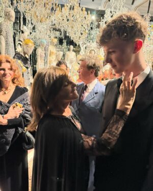 Eva Herzigová Instagram - Party with mum! In style indeed…and so much more. Exquisite exhibition and cultural whirlwind of Dolce&Gabbana world of the past 40 years! Thank you Domenico and Stefano for this wonderful opportunity and dressing my son George…the brand legacy continues on with a new generation. It made me smile seeing George and I getting ready together. And then having @carineroitfeld having her final touch!❤️