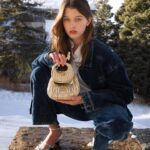 Ever Anderson Instagram - Thank you @miumiu gifting me the gorgeous Wander Bag along with the mini baby version!! Miu Miu x the great outdoors ❄️ #miumiu #miumiuholiday #ad #chrisbrennerphoto