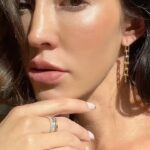 Fernanda Romero Instagram - 🤍 I've been really into Korean skincare lately. It's been great for my skin, as you'll see in the video, so keep scrolling. It's left my skin looking beautiful and dewy. @skin1004official - Madagascar Centella Probio-Cica Intensive Ampoule This @hourglass combo lipstick is perfection. I like to mix these two. I start with the neutral tone wearing #Sparrow, and then I add a bit more gloss, 'Crave 140', for a little pink. I also love the @westmanatelier Lip Suede Lipstick Palette to outline my lips and sometimes even use it for my cheeks. I used color #MulledWine. @loewe_perfumes this scent is the perfect mix of not going one extreme to another. Is in between musky but fresh. Jewelry @jewelsbymonicaguzman 🤍🫶🏽