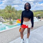 Freddie Ransome Instagram - my favorite look from @afro.tech weekend! thanks @culturehouseofficial for having me spin some chunes! top: @heronpreston skirt: @ansarelithelabel boots: @maisonmargiela bag: @brandonblackwoodnyc sunnies: @akila.la X @chinatownmarket