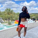 Freddie Ransome Instagram - my favorite look from @afro.tech weekend! thanks @culturehouseofficial for having me spin some chunes! top: @heronpreston skirt: @ansarelithelabel boots: @maisonmargiela bag: @brandonblackwoodnyc sunnies: @akila.la X @chinatownmarket