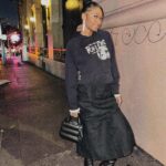 Freddie Ransome Instagram - to getting more fits off in ‘24🍾 hoodie: @thegoldlist.co skirt: @maimoun_store boots: @marni bag: @coach