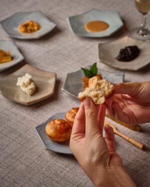 Garima Arora Instagram - 🍌🍌🍌 Kuzhi Paniyaram broken down into this sweet- savory  dessert is a perfect ode to bananas and my forever love for the fruit. 

1. Wild honey spiked paniyaram 
2. Fermented banana caramel
3. Coconut jaggery chutney
4. Homemade butter 
5. Sweet n spicy Podi with ghee 
6. Star fruit jam 
7. Egg Banana or Kluay Kai banana- so cute n tiny 
8. Banana water 

Make your own bite. Find your favorites. Mix and match. Use your hands. No better way to eat.