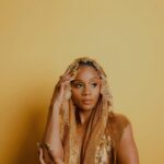 Geffri Maya Instagram - You got to be wearin' gold the twenty four carat kind. Photographer: @mayaiman Hair: @ryanburrellhair MUA: @aaronpaulbeauty Nails: @studionailsbyanissa Millinery: @studioabyanissa Studio: @1043mixedmedia