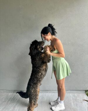 Geles Rodriguez Instagram - happy 1st birthday baby Cosmo 💫🖤📸🐾
•
•
spend the day taking Cosmo to petsmart to pick out a toy, then stopped by to visit the Easter bunny, took him for a pup cup (he’s totally gonna get the poops but it’s his birthday so I’m going to let him live 🙃) and of course let him catch the breeze on the way home 🫶🏼