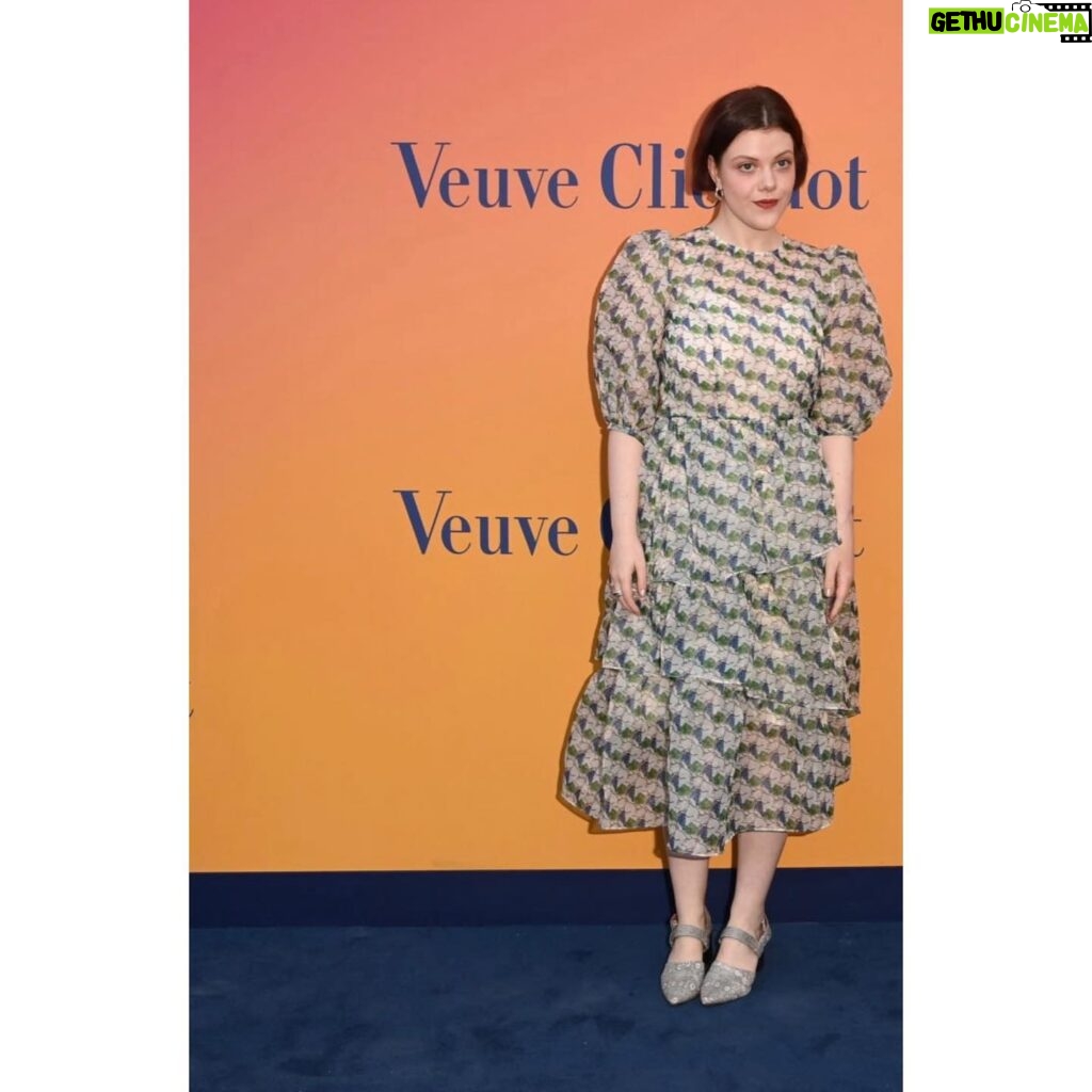 Georgie Henley Instagram - a very happy grape! completely joyous to celebrate female entrepreneurship and creativity with @veuveclicquot at their stunning exhibition Solaire Culture, bringing some much needed sunshine to London until the 6th June 🍇☀️🥂