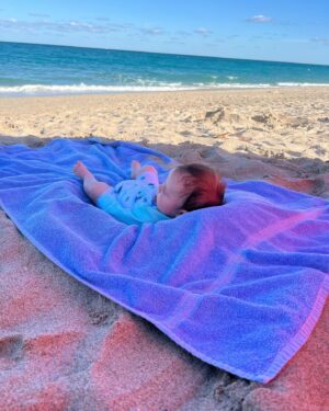 Georgina Bloomberg Instagram - No better way to celebrate 3 months of being alive than to see the ocean for the first time, and no better way to celebrate 3 months of being your parents than to be able to do it with you Sebastian. 👶🏻💙🌊