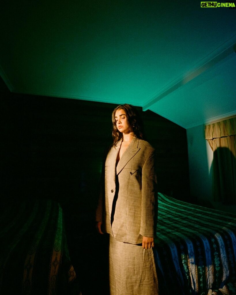 Geraldine Viswanathan Instagram - motel shoot w my beloved @james.pdf 💚 wearing a custom @ivybyindira dress and some bottega as well 💅🏾 thank you @instyleaus and @courtneypearl 🫧