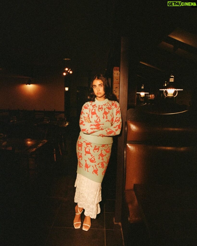 Geraldine Viswanathan Instagram - motel shoot w my beloved @james.pdf 💚 wearing a custom @ivybyindira dress and some bottega as well 💅🏾 thank you @instyleaus and @courtneypearl 🫧