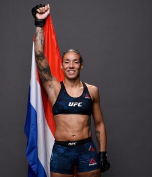 Germaine de Randamie Instagram - With pride and honor I carry this flag.  I carry the pride of a whole nation🇳🇱 Last one standing 💪 #lastonestanding #holland #netherlands #utrecht #germainederandamie #teamironlady #fitdutchie #ufc #ufcfighter #prouddutchie #roodwitblauw #pride #athlete #fighter #blessed #tattooedgirl “DIE WITH MEMORIES,NOT DREAMS”