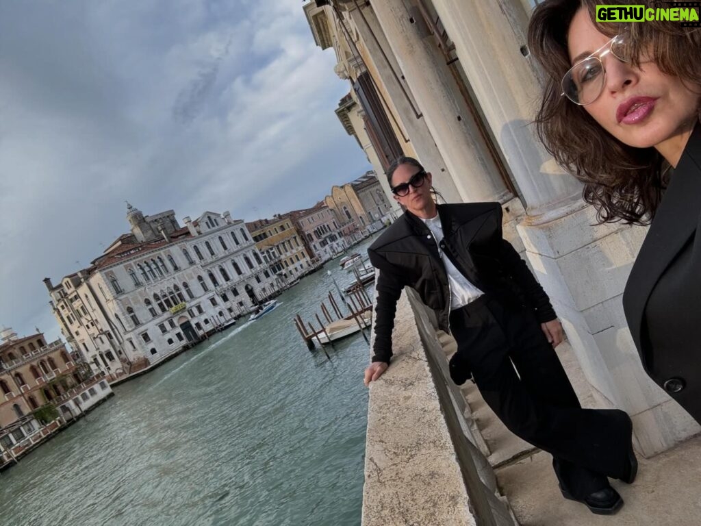 Gina Gershon Instagram - 25 years ago my sistah @amandademme and I stood on this same balcony. Everything and nothing has changed. #venice #biennale #friendship