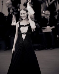 Gina Stiebitz Instagram - The dreamiest evening at the red carpet premier of ‘Poor Things‘ from Yorgos Lanthimos @labiennale Thank you @armanibeauty for having me 🌹 Picture: @ilushina_sasha #Makeup : @michalatus Hair: @valentinahstyle Outfit: @giorgioarmani #Venezia80 #Armanibeauty