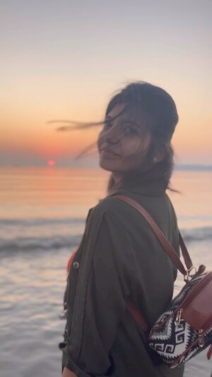 Gouri Agarwal Instagram - COMPANIONSHIP💕
Walking with the soothing waves
Watching the sun slowly disappear
Feeling it’s settling rays holding peace, 
and whispering a promise for tomorrow..
while witnessing the sky preparing to welcome another companion - the moon✨

.
.
.
.
#companionship #sunset #waves #soothing #inlove #peace #promise #companion #togetherness #versovabeach #live #laugh #love 💫❤️✨