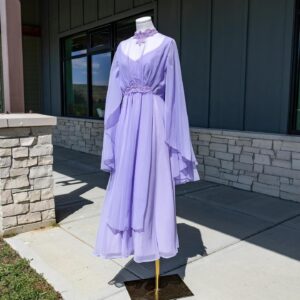Grey DeLisle Instagram - **SOLD**
Exceptional Ethereal Lavender Dance Goddess Gown 
$125 shipped to Anywhere, USA 
Size: Approximately a modern size 6 

Stunning 1970’s vintage draped chiffon goddess dress crafted from sheer poly chiffon over solid crepe. Crocheted floral appliqués. Zips up the back. 

Note: This is a true lavender. It looks different from photo to photo depending on the light, but definitely lavender and not periwinkle or pink.

Label: ‘Dance Allure’

Overall length: 54-1/2
Bust: Approximate: 34-36” 
Waist: 27-28”
Hips: free
#lavender #goddess #70s #vintage #dance #greydelisle
