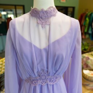 Grey DeLisle Instagram - **SOLD**
Exceptional Ethereal Lavender Dance Goddess Gown 
$125 shipped to Anywhere, USA 
Size: Approximately a modern size 6 

Stunning 1970’s vintage draped chiffon goddess dress crafted from sheer poly chiffon over solid crepe. Crocheted floral appliqués. Zips up the back. 

Note: This is a true lavender. It looks different from photo to photo depending on the light, but definitely lavender and not periwinkle or pink.

Label: ‘Dance Allure’

Overall length: 54-1/2
Bust: Approximate: 34-36” 
Waist: 27-28”
Hips: free
#lavender #goddess #70s #vintage #dance #greydelisle