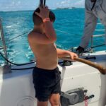 Hannah Goldy Instagram - Such a beautiful experience for Odin and I 🌊🐠🩷 Thank you @sailgetaways for adding another amazing core memory to our scrap book! …. The last pic is hilarious. I made him wake up to watch the sunrise with me 😂