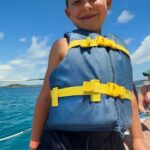 Hannah Goldy Instagram - Such a beautiful experience for Odin and I 🌊🐠🩷 Thank you @sailgetaways for adding another amazing core memory to our scrap book! …. The last pic is hilarious. I made him wake up to watch the sunrise with me 😂