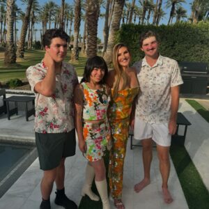 Heather McDonald Instagram - Slide Right. I Had a 1970 themed Palm Springs party last night. I got this dress b/c I knew it would pair perfectly with my sister’s.  Shannon is wearing our mom’s dress from the early 1970s. How cute is my daughter in @trinaturk More pics and videos to come. No filter or photo shop on these FYI @goldstein.shannon @kraftmackncheese @deniseaustin @thebrandyhoward #palmsprings #laquinta #party #cocktails #pool #palmtrees #memorialday #1970s #eveningdress #juicyscoop #heathermcdonald @shophelsi is my dress