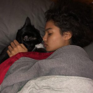 Helena Howard Instagram - The 31st of October. A day known for many reasons but it was the day I decided to make your date of birth back in 2013 when you were adopted at just 8 weeks. Natas-Satan backwards-
You were a gift-truly and I knew from that moment we would be best friends. However, life would be cruel, in the end you would be taken too soon in June of 2020 at the young age of 6 years 7months. I would give anything to have you back (but I’m not about to go and do some pet cemetery shit. Fuck outta here haha) so maybe not. I love you so much my love. 
We’ll Meet Again. Don’t know how. Don’t know where. But I know we’ll meet again. Some Sunny Day. 
Merci pour tous les moments merveilleux, je t'aime pour toujours et toujours🙏🖤🌕✨💋