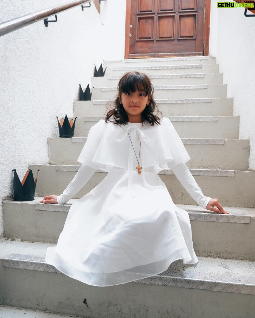 Helga Krapf Instagram - Another milestone: Amelie’s first holy communion. 🙏🏼 She was so excited for this and was so kilig to finally get to try that “white thing” mommy always eats in mass. 🙈😆😅 Made sure she got a piece of home with her by letting her wear a custom made Filipiniana inspired @thehouseofenchante dress. She looked like a little priestess 😍 Her candle is from Portugal, blessed at Our lady of Fatima which we then designed together using wax paper. The cake was made by me with the help of @puratosph 🤭 Only the best for my little miss. 👧🏻 Thank you to our family and friends, and to those who helped make this happen. ☺️ To Amelie, Congratulations on your first holy communion. May God bless and protect you always my love. Love you to the moon and back. 🥰🙏🏼