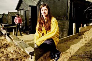 Holly Earl Instagram - Flashback! Baby faced 17 year old me, still looking 12, taken on my first acting job as an almost adult. Before I realised haircuts were a thing. (I spy a pensive @matineeidle in the background)