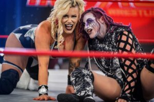 Holly Letkeman Instagram - The Demon and the Valkyrie on the same page, laying waste to all that stand in our way.. Do not expect any negotiation of the cessation of hostilities anytime soon, mortals.. #Ragnarök truly embodies the Shadow’s #WantTakeHave philosophy.. #DemonAssassin #WeraLoca #ImpactonAXSTV #BoundForGlory #DeathDealer #Decay 📸: @beezzzzy gear: @byjolene