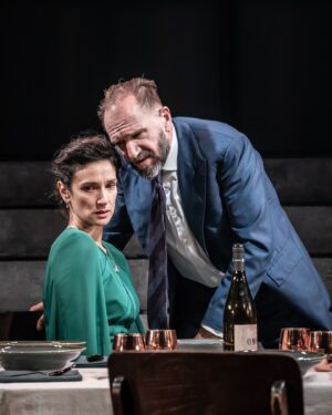 Indira Varma Instagram - Just released: brand new production shots of #RalphFiennes and @indiravarma in #MacbethTheShow. Now playing in Edinburgh until 27 January. London performances begin 10 February.
 
📸: @marcsbrenner
🎟️: macbeththeshow.com
 
Creative Team:  Simon Godwin - Director
Frankie Bradshaw - Set and Costume Design
Emily Burns - Adaptor
Jai Morjaria - Lighting Designer
Christopher Shutt - Sound Designer
Asaf Zohar - Composer
Sam Clarkson for Sound Quiet Time - Co-Sound System Designer Lucy Cullingford - Movement Director
Susanna Peretz - Hair, Makeup & Prosthetics Designer
Kate Waters - Fight Director
Amy Ball - Casting Director