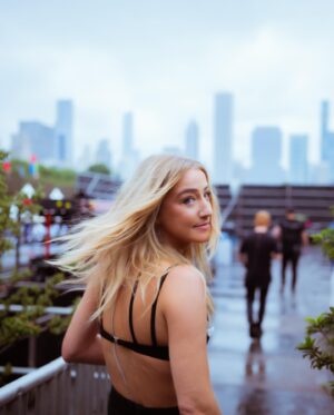 Ingrid Andress Instagram - baby’s first lolla did not disappoint!! thank y’all for coming out in the rain to see me 🫶🏻 top 5 artist bucket list moment for me 🥹

📷 @worldfamousmuriel