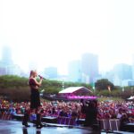 Ingrid Andress Instagram - baby’s first lolla did not disappoint!! thank y’all for coming out in the rain to see me 🫶🏻 top 5 artist bucket list moment for me 🥹 📷 @worldfamousmuriel
