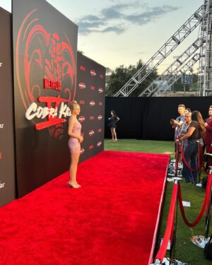 Isabella Crovetti Instagram - Tyy @netflix ! Missed @tannerbuchananofficial 🤧🥋❤️ @cobrakaiseries 

#netflix #premiere #redcarpet #carpet #photos #pose #dress #glam #cobrakai #show #tv #actress #premier