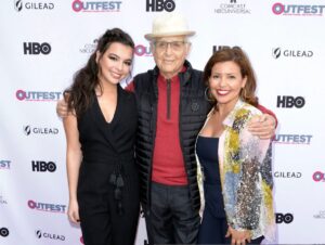 Isabella Gómez Instagram - I like to think that I had a special bond with Norman, but I know hundreds of people feel that way. That’s just the kind of guy he was. He made you feel special, he made you feel seen. That’s what he did for millions around the globe, decade after decade. He changed the course of history and he changed my entire life. I am a better person for having known Norman Lear. I am more aware, curious, empathetic and am much more inclined to stand up and fight. Norman made me feel like I too could change the world. He made me feel like I was worthy of playing a character like Elena Alvarez. He made me feel like I was an important part of his legacy, his world altering legacy. I’ve heard dozens of people say this to Norman over the years and now I will say it and mean it as well: 

Norman, you raised me. To know you is not only to love you, but to be infinitely inspired by you. There are no words for the immense pride and gratitude I feel knowing I got to be on this earth at the same time as you and got to do what we both love most together. What a privilege. What an honor. Thank you for everything, especially for giving me a second family and leading us all so beautifully. Being your ‘newest daughter’ is my greatest accomplishment and I hope to carry you with me and live a life that would make you proud until we get to see each other again. I love you beyond the beyond. Wherever you are, I hope you’re better now, my sweet friend.