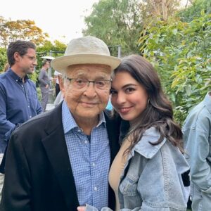 Isabella Gómez Instagram - I like to think that I had a special bond with Norman, but I know hundreds of people feel that way. That’s just the kind of guy he was. He made you feel special, he made you feel seen. That’s what he did for millions around the globe, decade after decade. He changed the course of history and he changed my entire life. I am a better person for having known Norman Lear. I am more aware, curious, empathetic and am much more inclined to stand up and fight. Norman made me feel like I too could change the world. He made me feel like I was worthy of playing a character like Elena Alvarez. He made me feel like I was an important part of his legacy, his world altering legacy. I’ve heard dozens of people say this to Norman over the years and now I will say it and mean it as well: 

Norman, you raised me. To know you is not only to love you, but to be infinitely inspired by you. There are no words for the immense pride and gratitude I feel knowing I got to be on this earth at the same time as you and got to do what we both love most together. What a privilege. What an honor. Thank you for everything, especially for giving me a second family and leading us all so beautifully. Being your ‘newest daughter’ is my greatest accomplishment and I hope to carry you with me and live a life that would make you proud until we get to see each other again. I love you beyond the beyond. Wherever you are, I hope you’re better now, my sweet friend.