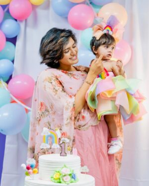 Iswarya Prabakar Instagram - •••• 1 year with KALKI ••••
This was the fastest at the same time slowest year of my life 💞 
There were moments which I wish I could freeze & replay forever & moments which I so badly wanted to push forward (all new parents can relate)
•••KALKI my love I ain’t gonna be diplomatic & say “Thank you for choosing us as your parents” 
YOU for sure tested us to our max 🤪 but brought the best out of us!
YOU tested our limits & made us build better !
I never knew I had this much potential & could accomplish these many tasks all at once..
YOU for sure made our lives more colorful like the rainbow 🌈(hence the rainbow 1st birthday theme) & get ready for one Joyful ✨ Fun filled ✨ Crazy ride called Life with US…
You will fall & get back up again in life  just like how you are practicing walking now….but always remember Amma Appa got your back 🤗🥰….
Cheers to the truck load of memories 🥂 and million trucks more to come..!!!!
LOVE YOU KALKI PRAYA 🌈✨💞
•
Birthday moments beautifully captured by @cocoonmedia.us @photokkari ✨