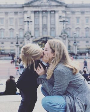 Jacinda Barrett Instagram - Kissing in front of the Queen. #buckinghampalace Happy Mother’s Day to my Mum and all the extraordinary Mums around the world and to my angels for all of it. #thankyou #bestjobever