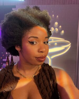 Jacklyn Uweh Instagram - Let me live out my unfriendly Black hottie dreams. 
Something tells me I should let @co_mill dress me more. 🥰❤️