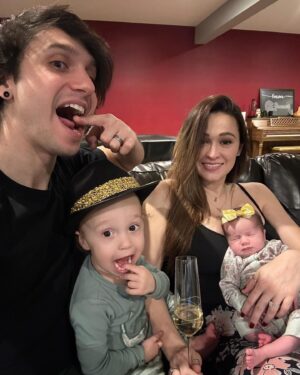 Jaclyn Glenn Instagram - 2023 was good to us ✨🥂✨ Happy new year from 2 tired parents and 2 adorable littles 💛