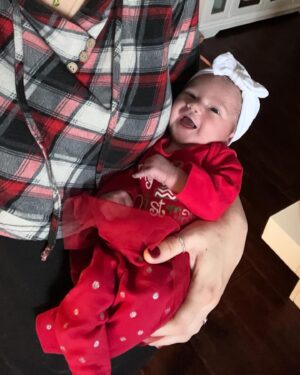 Jaclyn Glenn Instagram - Christmas morning smiles from a 4 day old! 🥹 I know it’s just her learning how to move facial muscles at this point, but still so stinkin cute!!! 🥰