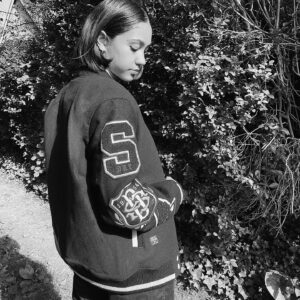 Jade Alleyne Instagram - A cool, detailed jacket I can chuck over the top of a plain fit and take it up a level is a go to for me 🙌🏽 @superdry just came through with the sickest vintage varsity jacket! Check my story for the link ;) #NoBetterStory #ad ⚡️
