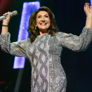 Jane McDonald Instagram - I always wear a short dress at the end of my shows as they bring a disco vibe. I brought this dress in New York and loved its Studio 54 vibe! I wore it on my 2021 tour. 🪩 💃🏻
