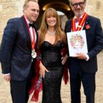 Jane Seymour Instagram - Last night I had the honour of presiding an exceptional evening at the Gala of Le Chapitre des Roses at @chateau_clos_vougeot. ✨ I also received the highest honour of Chevalier du Tastevin (the Burgundy Wine organization).⁣ ⁣ The cover of the menu was my self portrait as a wine woman and the back had another of my paintings! The cake was great, it had the traditional snail and my image on it.⁣ ⁣ We brought friends from all around the world together around Pinot Noir and Chardonnay… around 550 to be precise! 🤩 Merci @jc_boisset and @galloboisset!⁣ ⁣ Sharing this with all of you so that you could join in on the celebration, I hope you enjoy! 🫶