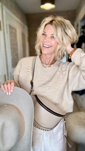 Janet Gunn Instagram - I Hope everybody had a good weekend! 
Here are Hair products that are Oh So Good!! 
I am loving my new flat from @ghd_northamerica 🙌🏻 this wand heats up in about three seconds!
@philipb detangler is a must-have for me; even though my hair is thin, it tangles very easily! I also try to go easy on my very front pieces because I don’t want to break them off, I think the best thing to do is blend them in.
Bag @isabelmarant 
@unite_hair is a real game changer when it comes to Sheen and giving my hair a beautiful and healthy glow ✨ plus, the fragrance is my absolute favorite of all hair products! A multi-tasking argan oil formulated to nourish, repair, smooth frizz and flyaways, and protect blonde hair. It Works!!
Thank you @chanluu for my beautiful necklace with a little pearl of wisdom🙏
My lip liner from @nudeenvie is the one I wear every day 
@maccosmeticsusa 👄 Le Cream
@benaarla sweater (might be out of stock)
I decided to bust out my red boots from @lucchese 
Skirt @vince Necklace @sydneyevan 
We are Headed to our friend’s birthday party for a little Mexican fiesta celebration!
And Any chance I get to wear my cowboy hat from @thesehandscollective 
I’m in 🙌🏻
#grwm #haircare #hairwand #beautyover50 #chiccowgirl #styleinspo