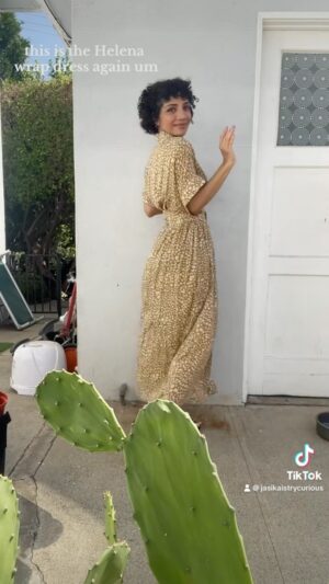 Jasika Nicole Instagram - Another #helenawrapdress by @just_patterns in animal print rayon from @lafinchfabrics_new and a #marjorieslingbag by @heyjunehandmade in spotted leather from a local shop plus memade clogs to make round out this *last dregs of summer fit check* (though who am I kidding- it will be hot in LA til November 🥵). I am in love with the silhouette and ease of wear of this dress which is why I made it twice, but I think the instructions are unnecessarily tricky and so are a few of the pattern pieces- the explanation for making the waistband is pretty confusing and I thought it was because the first time I made it years ago I might have been tired or something, but this time around I got stumped by the exact same things! Wouldn’t recommend this to a confident beginner but it was definitely worth the trouble for how beautifully it came out- I lengthened the dress several inches to make it a maxi and otherwise made no mods. I’m on the fence about what to make next- I have one last warm weather jumpsuit on my roster and not sure if I should wait til next year or squeeze her in now, as I have *several* fall/winter pieces I’m excited about too! Love being overwhelmed by inspiration and ideas-I know that wherever I end up will be great 🥰
