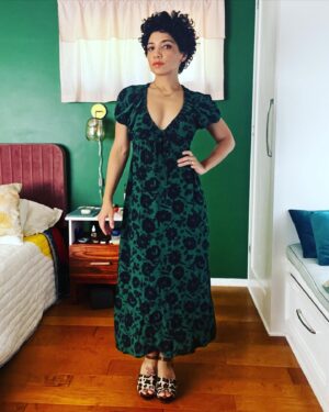 Jasika Nicole Instagram - This has been in heavy rotation this summer, which was an unexpected surprise. I thought it might be too dressed up to wear casually but I was wrong- it’s surprisingly comfortable and feels like a regular sundress, although it’s clearly anything but. I was inspired to make this after I saw @whatkatiewears and @ravelout ‘s versions. The pattern is the #oonadress by @vikisews, a Russian pattern company. The instructions were surprisingly great as I’ve found that a lot of translated instructions can be a bit sparse or lacking. But these came with good pics, detailed instructions and was easy to follow, which was important considering the unique construction. It came together pretty quickly by using facings to create tunnels for all the elastic and the drawstring. My only suggestion would be to keep as many of your elastic casings open on one end as possible til most of the dress is constructed, then try it on to make sure the elastic lengths are comfortable for you; I had to shorten my neck elastic by several inches in order for it to feel secure. Others who made this dress ended up having to stitch the center up a couple of inches so they wouldn’t feel too exposed which is a great fix, but my B cups are able to feel totally fine in such a low cut. Someone once told me they were “blessed by the booby gods” cause they were so well endowed, and it really changed my perspective on my own relationship with my body because I also think I was blessed by the booby gods, but for the opposite reason 😂despite what uber self conscious high school Jasika thought was desirable in the 90’s, it turns out that I adore my small boobs! They are so easy to manage! I could run for an hour without a bra and not hurt! I can go braless in a t shirt and no one will even notice. I can wear inexpensive bras and still feel supported! Moral of the story is, a true blessing is one that brings you peace, whatever that may look like. Sincerely,
Card Carrying Member of the Itty Bitty Titty Commitee 
Beautiful fabric is a green and dark blue rayon(?)) from @blackbirdfabrics ❤️