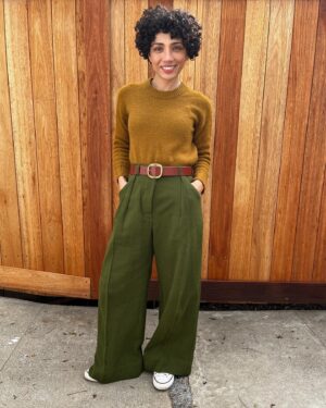Jasika Nicole Instagram - These are the #proteapants by @paradisepatterns in Kolkata fabric from @stonemountainfabric and I am in absolute love! Wide pants haven’t been my jam since JNCOs quietly excused themself from my delia*s catalogues so I was surprised at how excited I was to make, wear and style these but *wow* they did not disappoint. Going up to a size 61” hip, these comes in two views, one with the deep pleat like what I’m wearing, and one without. I only made a couple adjustments to these- I changed the side seam pocket to a curved one because they lay on my body better, and I edge stitched the fold of my pleat on the front and back to make sure it stayed crispy and  clean looking. I’ve always been so fearful of wide pants without heels underneath them because I’m afraid they will swallow me up since I’m on the short side, and I’m so glad I was wrong- I can’t wait to pair them with sandals and other flats! All of Paradise patterns have been a real joy to make- she always includes some technical tidbit in the instructions that I’ve never heard of that I can then add to my sewing vocabulary and I LOVE how she included instructions to get a top stitched look or a clean look- I usually just automatically top stitch pants because I learned this with jeans making and just stuck with it but excluding top stitching gives you a slightly different look and it’s those details that I am always thrilled to see included in indie sewing patterns. I absolutely want a summery pair in maybe a yellow or pastel pink? Not sure yet, but I definitely have more pairs of these in my future. Sweater is knitted from a pattern designer I won’t name, belt is memade and shoes are RTW chucks ❤️! PS we got a new fence! No more diamond encrusted metal wire for us (IYKYK lol)! I can finally take pics outside on our own property that don’t look awful 🥹