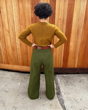 Jasika Nicole Instagram - These are the #proteapants by @paradisepatterns in Kolkata fabric from @stonemountainfabric and I am in absolute love! Wide pants haven’t been my jam since JNCOs quietly excused themself from my delia*s catalogues so I was surprised at how excited I was to make, wear and style these but *wow* they did not disappoint. Going up to a size 61” hip, these comes in two views, one with the deep pleat like what I’m wearing, and one without. I only made a couple adjustments to these- I changed the side seam pocket to a curved one because they lay on my body better, and I edge stitched the fold of my pleat on the front and back to make sure it stayed crispy and  clean looking. I’ve always been so fearful of wide pants without heels underneath them because I’m afraid they will swallow me up since I’m on the short side, and I’m so glad I was wrong- I can’t wait to pair them with sandals and other flats! All of Paradise patterns have been a real joy to make- she always includes some technical tidbit in the instructions that I’ve never heard of that I can then add to my sewing vocabulary and I LOVE how she included instructions to get a top stitched look or a clean look- I usually just automatically top stitch pants because I learned this with jeans making and just stuck with it but excluding top stitching gives you a slightly different look and it’s those details that I am always thrilled to see included in indie sewing patterns. I absolutely want a summery pair in maybe a yellow or pastel pink? Not sure yet, but I definitely have more pairs of these in my future. Sweater is knitted from a pattern designer I won’t name, belt is memade and shoes are RTW chucks ❤️! PS we got a new fence! No more diamond encrusted metal wire for us (IYKYK lol)! I can finally take pics outside on our own property that don’t look awful 🥹