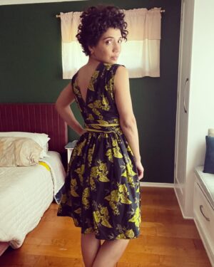 Jasika Nicole Instagram - I am pretty sure that this dress has gotten more compliments from strangers in one afternoon of wear than anything else I have ever made! I’m so surprised! Not that it isn’t beautiful, it’s just an unexpected make from my norm. The bold, pretty fabric is from @wearethefabricstore (gifted as an ambassador) which I chose because of the stunning chartreuse and dark green color combo, but I was stumped as to what to make with it. Then I remembered this cool tik tok video I’d seen a while back where a sewist named @g00dbad_ a low-to-zero waste dress out of a bedsheet and she very generously shared the template so that others could recreate it. It’s not a pattern exactly, but based on just a couple of your own measurements, it’s easily translated into a great wrap dress (very similar to vintage walk away dress patterns) that is very size/gender/age inclusive. I didn’t have a bed sheet to work with but I did have this fabric which I was still able to finagle the dress out of with a little problem solving. The result is so dynamic, with a vintage fit and flare silhouette paired with an impactful print. I didn’t change much to the basic instructions Cara gave but I did add interfacings and facings to my waistband, a buttonhole to one side of my dress opening for the belt to slide through, and I faced my belt with a complimentary fabric because I ran out of my main fabric. It adds some cool interest to the tie, which I love! This dress is easy to wear, doesn’t blow open and expose my bits on a windy day, and makes me feel so pretty! Check out _cccara on tik tok to watch her video if you want to make one for yourself! PS- yes my hair is shorter, no I didn’t want it this short and yes I hate it 🥴