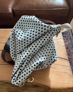 Jasika Nicole Instagram - I made the #mothwingcapelet by @minimalistmachinist last November and it was the *perfect* project to reignite my connection to sewing after taking a little hiatus. I’ve never made a pattern quite like it before- the instructions were sparse which was a little uncomfortable for me initially, but I think that was part of the magic- it gives you so much room to experiment and explore and make the wings super unique to you. Everything I used was from my stash and remnants of other projects except for the multi colored pieces on the front, which was actually a carpet sample I found at @remainders_creative_reuse . Wasn’t sure what inspired me to buy it but of course I’m so glad I did because when I ran out of the faux suede for the main body of the wing it allowed me to be inventive and create a more dynamic palette! The faux suede was leftover from throw pillows, the furry leather a bucket bag, the snakeskin-like leather is from a pair of shoes, the gold is what I used for my buddy Quinn’s Xmas gift, and the silk velvet is from the cris woods envelope dress I made last year. I am still stunned at the silhouette of this- from the side it really looks like moth wings at rest! What a fun project from a super talented, generous and out-of-the-box maker who is always contributing to the community in cool ways ❤️ I would suggest this project for intermediate makers and beginners with a knowledgeable buddy to talk them through any tricky parts (experiential know-how is important for this pattern as she doesn’t hold your hand through it, but my partner, a very beginner sewist, made a gorgeous pair with my help). Congrats, Rachael ❤️❤️❤️