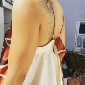 Jasika Nicole Instagram - The gorgeous marbled  #SmultronDress by @paradisepatterns that I made at the beginning of the year unfortunately suffered a mishap in the wash and got dyed green in some spots 😖 (pls, no advice on how to get stains out, thx). I’m sure I will wear it as a house dress once the sadness dissipates a little lol. But til then, I wanted to make another version that I could enjoy, untarnished. Since my first version was made with @corefabrics it seemed only fitting that my replacement version feature their fabric too. This viscose with zigzag print is just *chefs kiss*. Perfectly situated in my seasonal palette, it’s soft, it’s flowy (tried to capture it’s movement with the camera) and feels like a breezy silk. In a cruel twist of fate, I didn’t have enough fabric to make the extended length of the dress I wanted to, but instead of abandoning my plan I just amended it. I had a long cut of this off white dupioni silk in my stash and decided to sub it in for the back panel I was missing from my main fabric. It was risky mostly because the white silk is not quite as flowy as the viscose, but I was confident that it could be a design feature- a dress not only print and color blocked, but structure blocked too. It came out better than I thought it would- the change in fabric doesn’t bother me at all, and it’s still a really swishy, sexy dress to wear- it feels like it’s dancing around your body! I can’t wait to wear it at an event with my black high heel clogs! Big fan of this and the others from @paradisepatterns  and of course always loving the work that the @closetcorepatterns /@corefabrics team does, too 💕 summer hat by @byvladainsta 😍