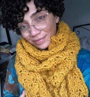 Jasika Nicole Instagram - I want to close out the year having documented my last couple months of making, which was inspired by finding my-my-my sewjo❤️ 
1. I finally decided to learn to read crochet patterns, and being a lifelong knitter, I’m glad I got over myself, as crochet has been scratching the itch that knitting has failed to accomplish the last couple years. I made this shawl mimosa by fiore in a couple weeks with yarn from @missceliespants that I only know as being an Italian wool and feeling like a silky cotton (as someone that’s sensitive to lots of wools that others seem to tolerate just fine, that’s saying a lot).
2. A crocheted doll for my new young friend Ruby ( pattern by @sweetsofties - she also has a little penis pattern that is so cute I might have to make some to give as gifts!) 
3. speaking of gifts I made the most Xmas gifts for others this year than perhaps ever and the joy and delight I got from it (even though I was stressed about finishing in time) was such a surprise to me. Maybe I’ve gotten better at making for others- Everything fit and everyone was happy! makes me excited to do it again maybe just start earlier than dec 1?!?!? 🙃
Peek-a-boo patterns kids button up in matching  African wax print for my nephews and… 
4. My dad! After he opened it he said it reminds him of a Nehru style shirt he loved that someone gave him when he was a kid 🥹 (Dan shirt by @efpattern )
5. Upstyled @quinnofeaglerock dream pants by partnering some bell bottoms on poshmark and with a little gold leather from my stash ⭐️ 
6. Used a gorgeous no-stitch leather pattern by @mprleatherworks to make some gifts out of leather in my stash- @lastassembly when are you dropping ur own 👀👀👀
7. I made this painters vest for my brother from sew what patterns on Etsy and was immediately obsessed with every detail. On him it’s fitted and looks great of course but when sized up with a cute little outfit underneath on me, it gives such a cool and relaxed aesthetic. I have already made plans to make one for myself in the same size 😮‍💨
8. The #mothwingcapelet by @minimalistmachinist is the project that got me out of my #NoSewJo slump in nov. It’s getting its own post soon 🧡